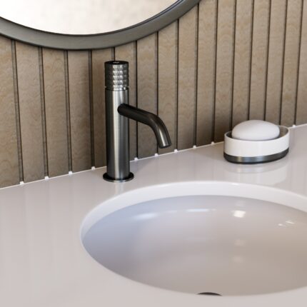 Grifo monomando HELIOS para lavabo de caño bajo.
